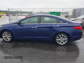 2012 Hyundai Sonata SE z VIN 5NPEC4AC5CH485157, wystawiony jako IAAI lot #42328758 z przebiegiem 222 576 mil mil oraz . Historia ofert i sprzedaży dostępna na DreamBid. Obrazek 14.