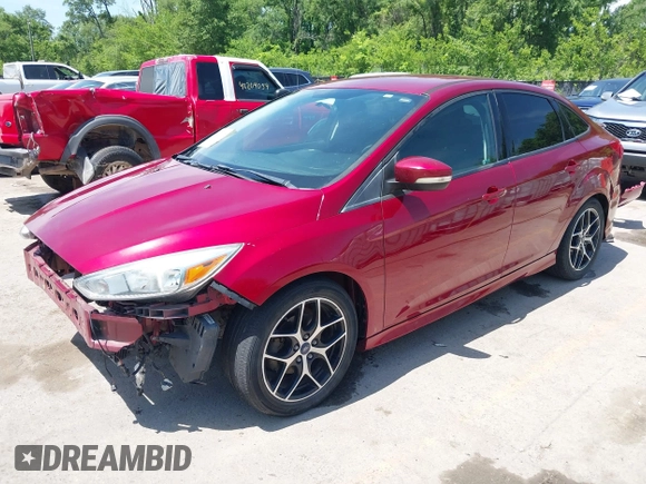 2015 Ford Focus SE with VIN 1FADP3F22FL275602, listed as a IAAI auction lot 42221421 with 112,864 mi miles and . Bid and sale history available at DreamBid. Image 2.