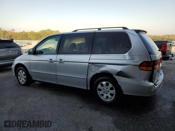 2003 Honda Odyssey EX-L with VIN 5FNRL18943B159553, listed as a Copart auction lot 72025294 with 182,942 mi miles and Salvage Title. Bid and sale history available at DreamBid. Image 2.