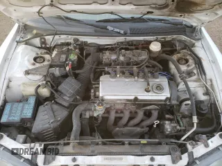 1999 Mitsubishi Eclipse GS with VIN 4A3AX35G2XE062629, listed as a Copart auction lot 87689125 with 223,210 mi miles and Salvage Title. Bid and sale history available at carsss.com. Image 7.