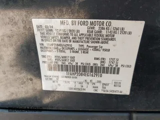 2014 Ford Taurus SE z VIN 1FAHP2D84EG162910, wystawiony jako IAAI lot #41779137 z przebiegiem Nie podano mil oraz . Historia ofert i sprzedaży dostępna na DreamBid. Obrazek 9.