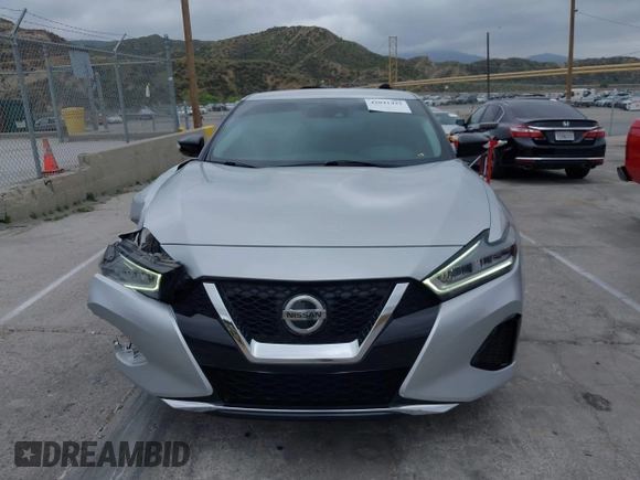 2020 Nissan Maxima SV with VIN 1N4AA6CVXLC380646, listed as a IAAI auction lot 42041422 with 99,579 mi miles and . Bid and sale history available at DreamBid. Image 12.
