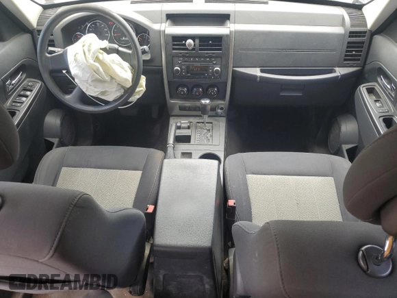 2010 Jeep Liberty Sport with VIN 1J4PN2GK8AW100147, listed as a Copart auction lot 63013305 with 161,400 mi miles and Salvage title. Bid and sale history available at DreamBid. Image 8.
