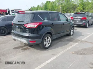 2016 Ford Escape SE with VIN 1FMCU0G73GUA91025, listed as a IAAI auction lot 42100978 with 164,241 mi miles. Bid and sale history available at carsss.com. Image 4.