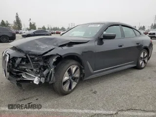 2023 BMW i4 eDrive35 z VIN WBY43AW08PFP65503, wystawiony jako Copart lot #52578605 z przebiegiem 26 014 mil mil oraz Szkoda całkowita • Salvage title. Historia ofert i sprzedaży dostępna na DreamBid. Obrazek 1.