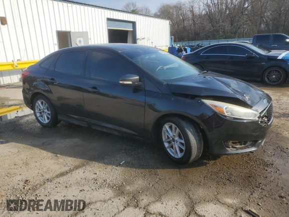 2015 Ford Focus SE with VIN 1FADP3F20FL257194, listed as a Copart auction lot 44021095 with 153,600 mi miles and Salvage Title. Bid and sale history available at carsss.com. Image 4.