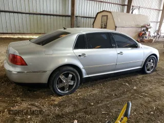 2004 Volkswagen Phaeton V8 z VIN WVWAF63D348008959, wystawiony jako Copart lot #63343254 z przebiegiem Nie podano mil oraz Czysty tytuł • Clean title. Historia ofert i sprzedaży dostępna na DreamBid. Obrazek 3.