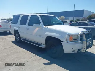 1999 Cadillac Escalade z VIN 1GYEK13R7XR410293, wystawiony jako IAAI lot #41835483 z przebiegiem 135 417 mil mil oraz . Historia ofert i sprzedaży dostępna na DreamBid. Obrazek 1.