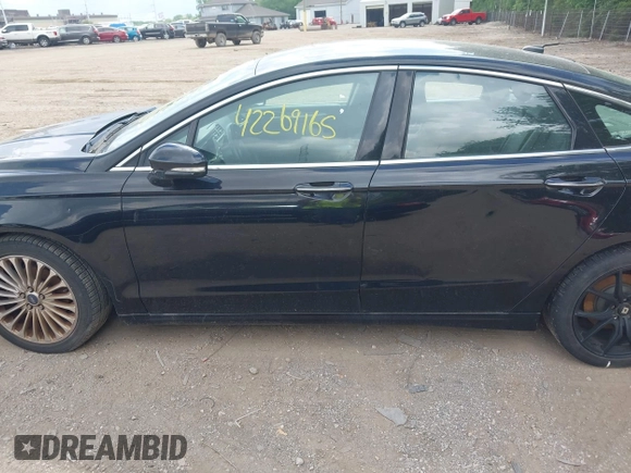 2016 Ford Fusion Titanium with VIN 3FA6P0K97GR135106, listed as a IAAI auction lot 42269165 with 155,036 mi miles and . Bid and sale history available at DreamBid. Image 14.