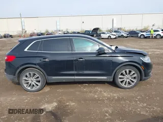 2016 Lincoln MKX Reserve with VIN 2LMTJ8LP3GBL71597, listed as a IAAI auction lot 40722178 with 230,704 mi miles. Bid and sale history available at carsss.com. Image 13.