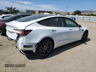 2025 Tesla Model 3 Long Range z VIN 5YJ3E1EAXSF914864, wystawiony jako Copart lot #60901055 z przebiegiem 4 174 mil mil oraz Szkoda całkowita • Salvage title. Historia ofert i sprzedaży dostępna na DreamBid. Obrazek 3.