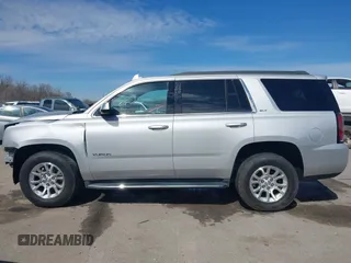 2019 GMC Yukon SLT with VIN 1GKS1BKC5KR277478, listed as a IAAI auction lot 41632624 with 86,770 mi miles. Bid and sale history available at carsss.com. Image 15.