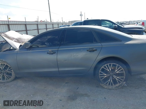 2013 Audi A6 Premium Plus z VIN WAUGFAFC5DN139163, wystawiony jako IAAI lot #41534011 z przebiegiem Nie podano mil oraz . Historia ofert i sprzedaży dostępna na DreamBid. Obrazek 13.