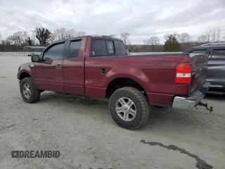 2005 Ford F-150 XLT with VIN 1FTPX14565FA16911, listed as a Copart auction lot 47700005 with 194,819 mi miles and Salvage Title. Bid and sale history available at carsss.com. Image 2.