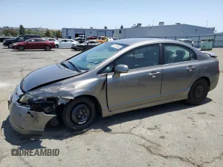 2006 Honda Civic LX with VIN 1HGFA16576L078946, listed as a Copart auction lot 61016565 with 140,155 mi miles and Salvage title. Bid and sale history available at DreamBid. Image 1.