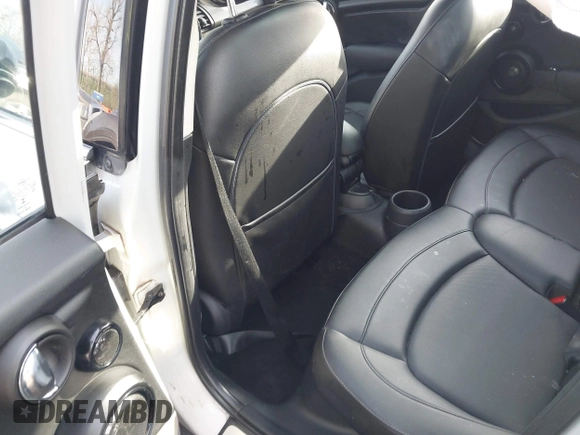 2016 MINI Hardtop 4 Door z VIN WMWXU1C54G2A93779, wystawiony jako IAAI lot #41933339 z przebiegiem 85 000 mil mil oraz . Historia ofert i sprzedaży dostępna na DreamBid. Obrazek 8.
