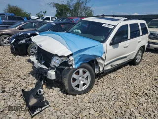 2009 Jeep Grand Cherokee Laredo with VIN 1J8HR48P89C532571, listed as a Copart auction lot 57309544 with 203,423 mi miles and Non Repairable. Bid and sale history available at carsss.com. Image 1.