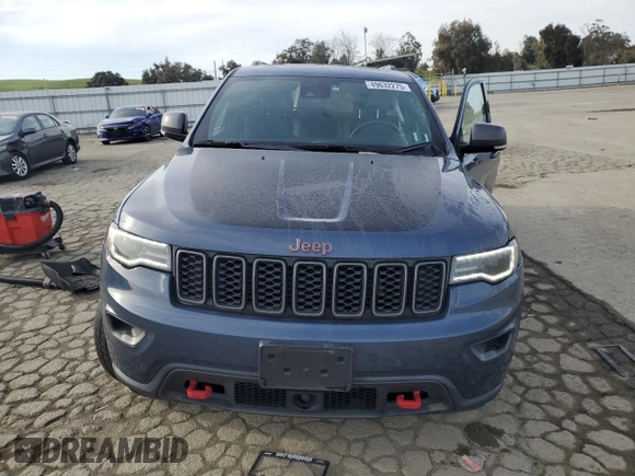 2021 Jeep Grand Cherokee Trailhawk with VIN 1C4RJFLG0MC525273, listed as a Copart auction lot 49632275 with 57,452 mi miles and Salvage title. Bid and sale history available at DreamBid. Image 5.