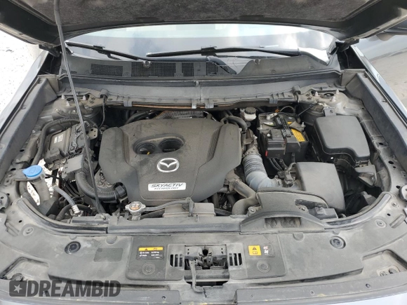 2019 Mazda CX-9 Grand Touring z VIN JM3TCADY9K0300284, wystawiony jako Copart lot #51801365 z przebiegiem 53 550 mil mil oraz Szkoda całkowita • Salvage title. Historia ofert i sprzedaży dostępna na DreamBid. Obrazek 12.