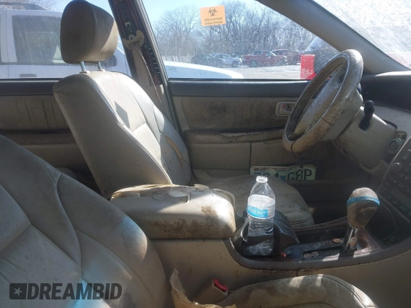 2002 Toyota Avalon XL with VIN 4T1BF28B82U216940, listed as a IAAI auction lot 41841874 with 298,982 mi miles and . Bid and sale history available at DreamBid. Image 5.