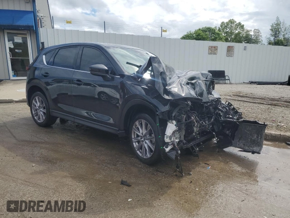 2019 Mazda CX-5 Grand Touring with VIN JM3KFBDM8K0620086, listed as a Copart auction lot 56211995 with Not provided miles and Non repairable. Bid and sale history available at DreamBid. Image 4.