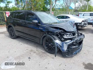 2022 Volkswagen Tiguan SE R-Line Black with VIN 3VVCB7AX9NM054351, listed as a IAAI auction lot 41665235 with 30,971 mi miles and . Bid and sale history available at DreamBid. Image 1.
