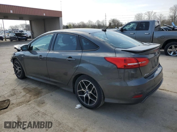 2015 Ford Focus SE z VIN 1FADP3F29FL340350, wystawiony jako Copart lot #53466455 z przebiegiem 146 374 mil mil oraz Szkoda całkowita • Salvage title. Historia ofert i sprzedaży dostępna na DreamBid. Obrazek 2.