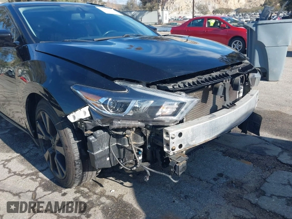 2018 Nissan Maxima S with VIN 1N4AA6AP9JC388366, listed as a IAAI auction lot 41842042 with 103,597 mi miles and . Bid and sale history available at DreamBid. Image 6.