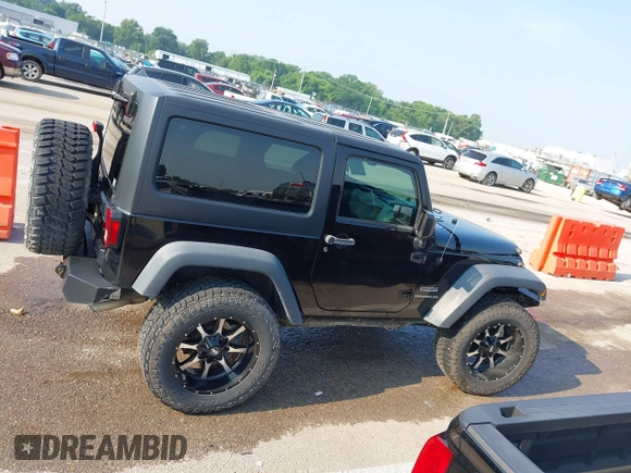 2017 Jeep Wrangler Sport with VIN 1C4AJWAG6HL654592, listed as a IAAI auction lot 42447379 with 61,585 mi miles and . Bid and sale history available at DreamBid. Image 13.