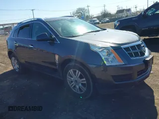 2011 Cadillac SRX Luxury Collection with VIN 3GYFNDEYXBS556758, listed as a IAAI auction lot 42054672 with 151,648 mi miles. Bid and sale history available at carsss.com. Image 1.