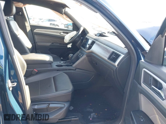 2021 Volkswagen Atlas SE with VIN 1V2JE2CA5MC206701, listed as a IAAI auction lot 41165558 with 52,631 mi miles and . Bid and sale history available at DreamBid. Image 5.