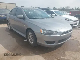 2014 Mitsubishi Lancer ES with VIN JA32U2FU5EU021654, listed as a IAAI auction lot 41552408 with 164,644 mi miles. Bid and sale history available at carsss.com. Image 1.