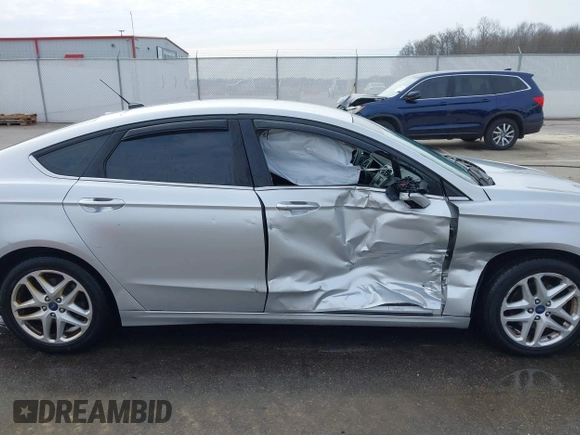 2014 Ford Fusion SE with VIN 3FA6P0HD4ER328113, listed as a IAAI auction lot 41702538 with 126,044 mi miles and . Bid and sale history available at DreamBid. Image 13.