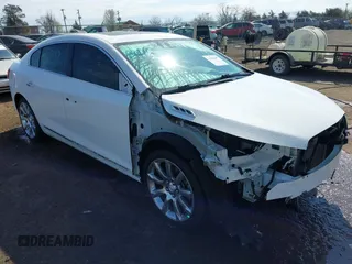 2014 Buick LaCrosse Premium I with VIN 1G4GD5G36EF304692, listed as a IAAI auction lot 41843897 with 65,774 mi miles and . Bid and sale history available at DreamBid. Image 1.