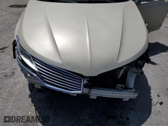 2014 Lincoln MKZ Hybrid z VIN 3LN6L2LU1ER821882, wystawiony jako Copart lot #62751275 z przebiegiem 260 413 mil mil oraz Nie do naprawy • Non repairable. Historia ofert i sprzedaży dostępna na DreamBid. Obrazek 11.