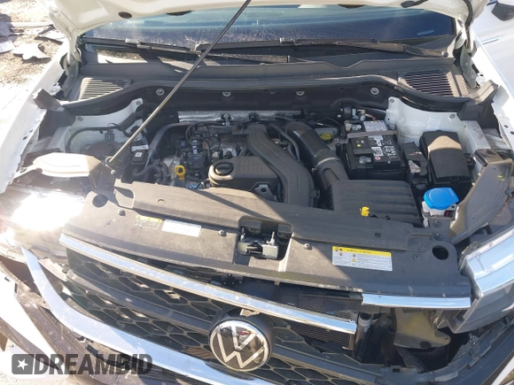 2024 Volkswagen Taos SE z VIN 3VVEX7B29RM025564, wystawiony jako IAAI lot #41350181 z przebiegiem 6 862 mil mil oraz . Historia ofert i sprzedaży dostępna na DreamBid. Obrazek 10.