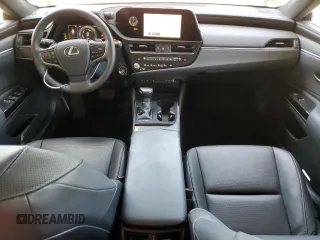 2023 Lexus ES 300h with VIN 58ADA1C18PU034705, listed as a Copart auction lot 56221745 with 43,267 mi miles and Salvage title. Bid and sale history available at DreamBid. Image 8.
