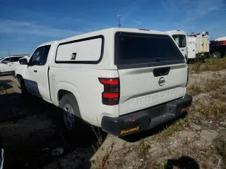 2024 Nissan Frontier S with VIN 1N6ED1CL8RN635597, listed as a Copart auction lot 69277294 with 7,927 mi miles and Salvage Title. Bid and sale history available at carsss.com. Image 2.