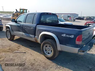 2004 Dodge Dakota SLT with VIN 1D7HG48N14S610012, listed as a IAAI auction lot 39853794 with 158,998 mi miles and . Bid and sale history available at carsss.com. Image 3.