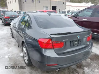 2014 BMW 3 Series 328d xDrive with VIN WBA3D5C55EKX98381, listed as a IAAI auction lot 41590673 with Not Provided miles. Bid and sale history available at carsss.com. Image 3.