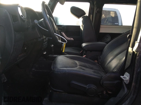 2014 Jeep Wrangler Sahara with VIN 1C4AJWBG3EL258582, listed as a Copart auction lot 74921604 with 17,777 mi miles and Non Repairable. Bid and sale history available at DreamBid. Image 7.