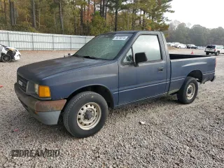 1993 Isuzu Pickup S z VIN 4S1CL11L2P4207469, wystawiony jako Copart lot #79279374 z przebiegiem 144 885 mil mil oraz Tytuł czysty. Historia ofert i sprzedaży dostępna na DreamBid. Obrazek 1.