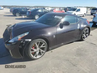 2014 Nissan 370Z with VIN JN1AZ4EH9EM637214, listed as a Copart auction lot 79490354 with 51,950 mi miles and Salvage Title. Bid and sale history available at carsss.com. Image 1.