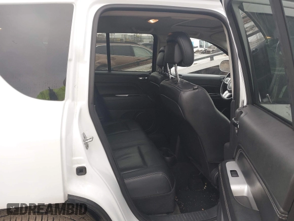 2017 Jeep Compass High Altitude with VIN 1C4NJDEB2HD110539, listed as a IAAI auction lot 41118827 with 94,663 mi miles and . Bid and sale history available at carsss.com. Image 8.