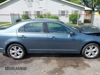 2012 Ford Fusion SE with VIN 3FAHP0HA2CR353765, listed as a IAAI auction lot 42205767 with 128,805 mi miles and . Bid and sale history available at DreamBid. Image 13.