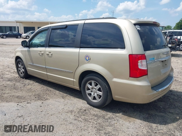 2011 Chrysler Town & Country Touring with VIN 2A4RR5DGXBR613179, listed as a IAAI auction lot 42143355 with 180,906 mi miles and . Bid and sale history available at DreamBid. Image 3.