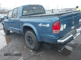 2003 Dodge Dakota SLT with VIN 1D7HG48N43S249020, listed as a IAAI auction lot 41580449 with 240,500 mi miles and . Bid and sale history available at DreamBid. Image 3.
