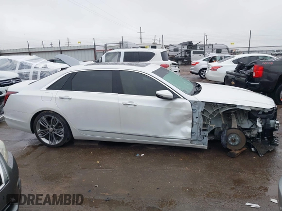 2019 Cadillac CT6 Luxury AWD z VIN 1G6KB5RS9KU114954, wystawiony jako IAAI lot #38260808 z przebiegiem 17 666 mil mil oraz . Historia ofert i sprzedaży dostępna na DreamBid. Obrazek 14.