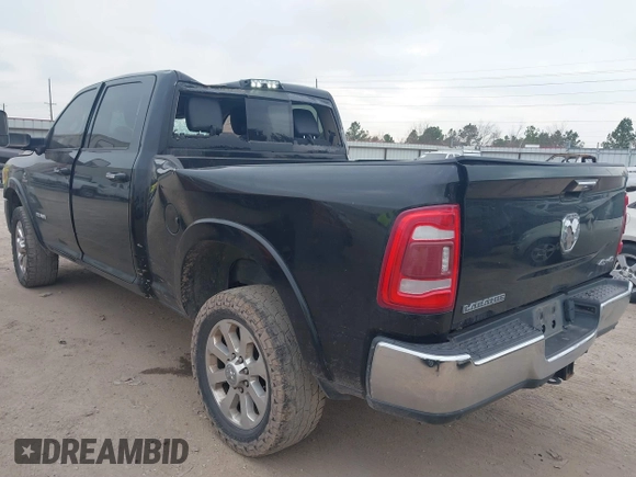 2020 Ram 2500 Laramie z VIN 3C6UR5FL6LG284652, wystawiony jako IAAI lot #41536970 z przebiegiem 92 566 mil mil oraz . Historia ofert i sprzedaży dostępna na DreamBid. Obrazek 3.
