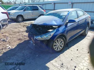 2022 Hyundai Accent SE with VIN 3KPC24A6XNE157129, listed as a IAAI auction lot 41317543 with 123,000 mi miles. Bid and sale history available at carsss.com. Image 2.